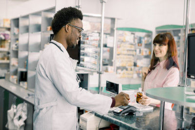 woman buying medicines